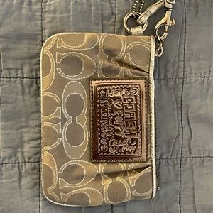 NWOT. Coach Mini Wristlet.